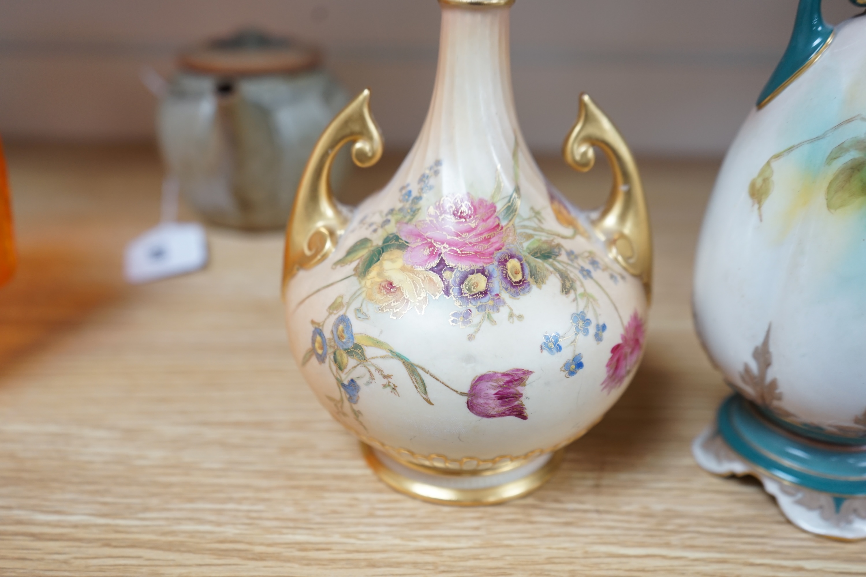 Two Worcester vases comprising blush ivory and one handpainted with roses by A. Watkins, together with a shell dish, largest 25cm high. Condition - largest vase restored